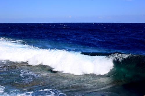 a large wave in the ocean at Beach safari nubian resort in Marsa Alam City