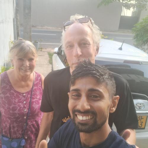 two men and a woman standing next to a man at RKO Villa27 - Unawatuna in Habaraduwa