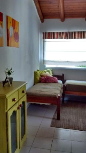a living room with a couch and a window at El Zohar 5 pax in Federación