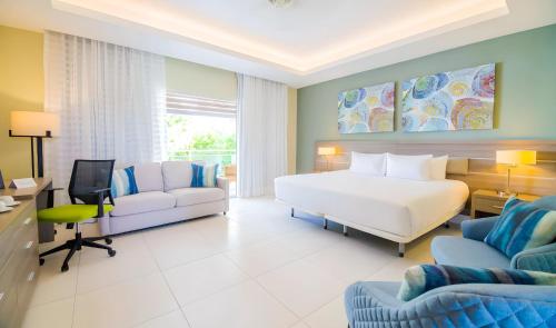 Postel nebo postele na pokoji v ubytování Bakour Punta Cana Suites