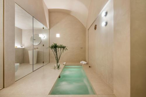 Phòng tắm tại Palazzo Dogali Suites Collection