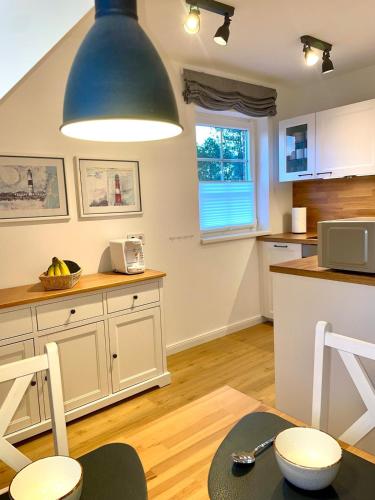Η κουζίνα ή μικρή κουζίνα στο Schönes Sylt-Apartement "Waihüs" im ruhigen Alt-Westerland