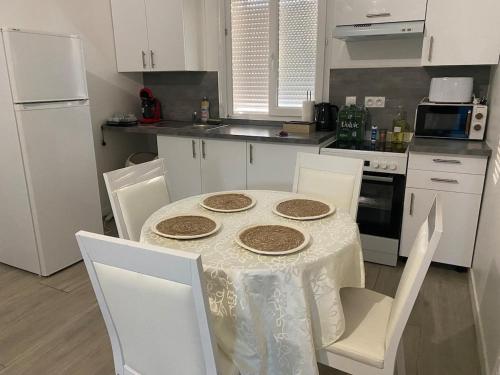 a kitchen with a table with cookies on it at F3 ,team, RER, Paris axis,professional axis, FR stadium in Arnouville-lès-Gonesse