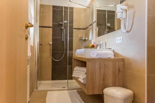 Ένα μπάνιο στο Apartment Sella - Unterkehrhof
