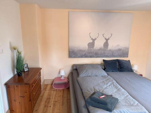 Postel nebo postele na pokoji v ubytování Oberbayern Lengenfeld 2 Wohnungen a 4 Schlafzimmer Neu umgebaut