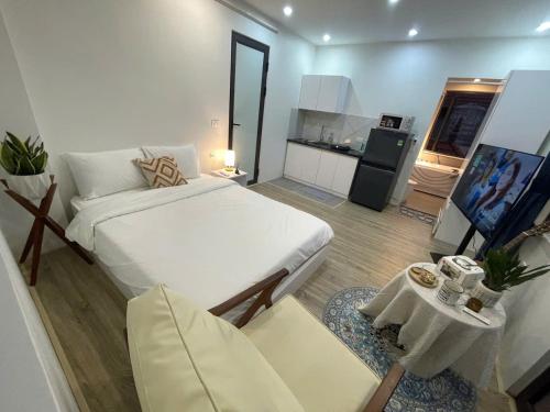 Ein Bett oder Betten in einem Zimmer der Unterkunft CHARM CHARM - kimmy housing - 48 To Ngoc Van