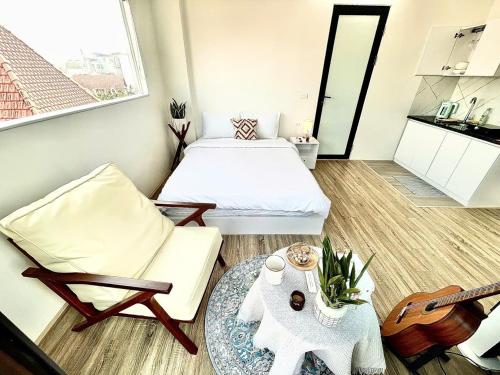 Ein Bett oder Betten in einem Zimmer der Unterkunft CHARM CHARM - kimmy housing - 48 To Ngoc Van