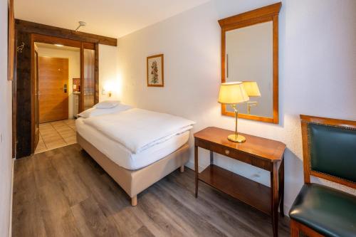 Postel nebo postele na pokoji v ubytování Arca Aparthotel & Spa