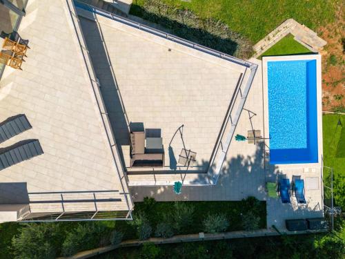 an overhead view of a swimming pool on a house at Villa Anna by Interhome in Opatija