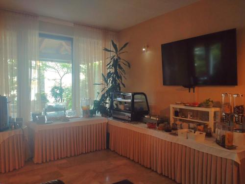 Příslušenství pro přípravu čaje a kávy v ubytování Guest House Palme