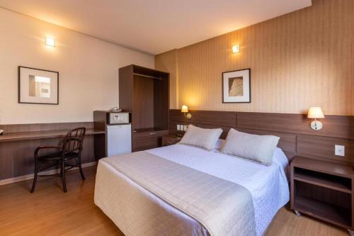 Ένα ή περισσότερα κρεβάτια σε δωμάτιο στο Hotel Bahamas