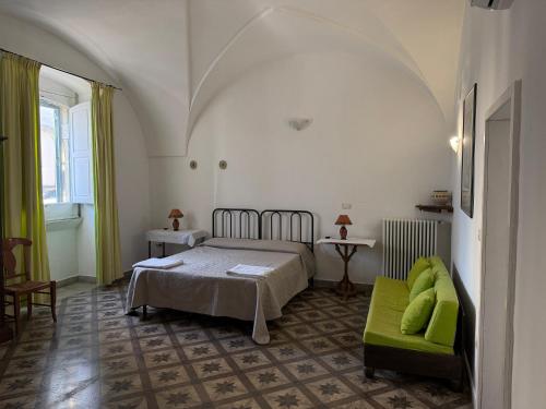 Postel nebo postele na pokoji v ubytování Residenza Storica PARCO LANOCE