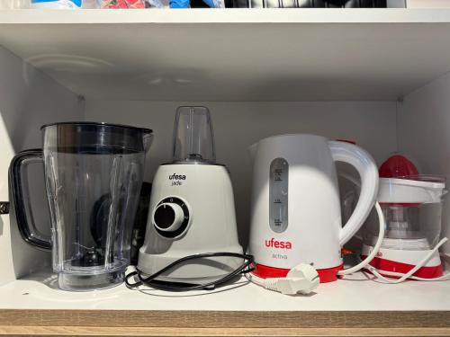 two appliances sitting on top of a kitchen counter at Cozy Studio in Rabat City Center in Rabat