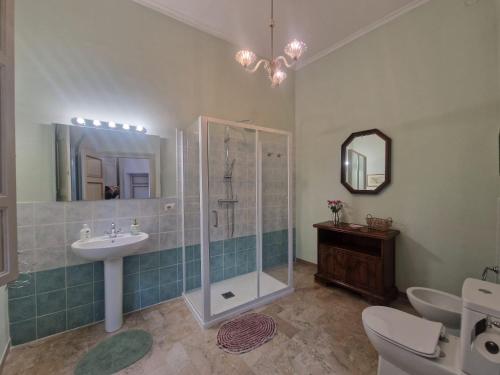 a bathroom with a shower and a sink at Secret villa's city garden in Perugia