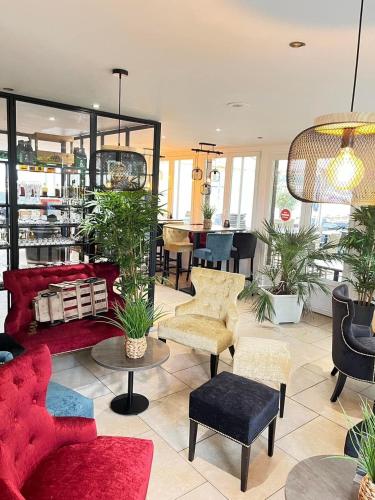 a living room filled with lots of furniture at Le Clos Joli in Haybes