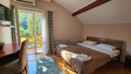 Postel nebo postele na pokoji v ubytování Hotel Koliba na Grza