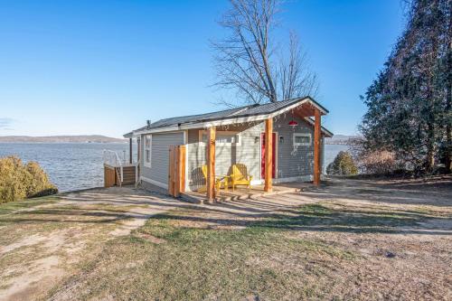 a tiny house on the shore of a lake at Lakeshore Vermont in Colchester