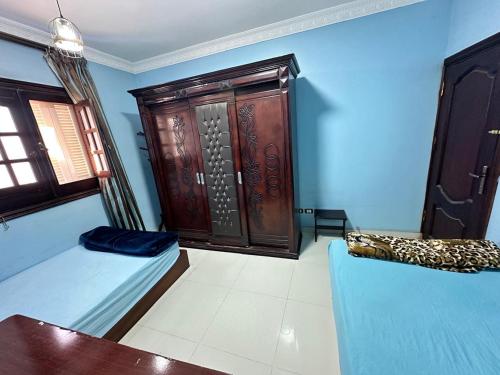 Postel nebo postele na pokoji v ubytování Misr Al Gadedah Rooms