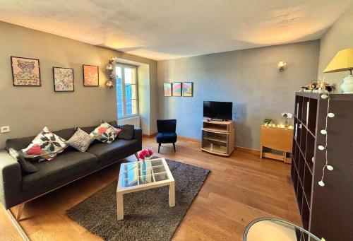 Coin salon dans l'établissement Le Fouquet - T3 Duplex Panorama d'Exception sur la Mayenne