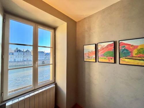 Photo de la galerie de l'établissement Le Fouquet - T3 Duplex Panorama d'Exception sur la Mayenne, à Laval