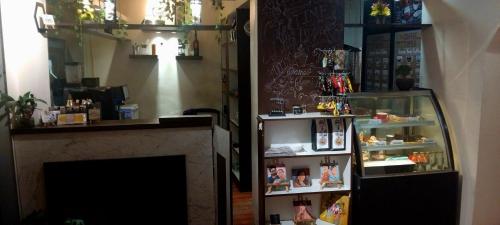 Cuisine ou kitchenette dans l'établissement Mystic Vibes International Fitness Commune