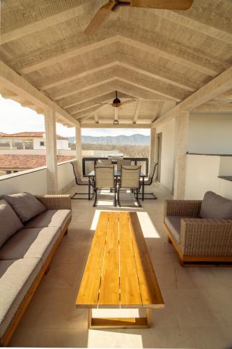 a living room with a couch and a table at Pueblo parvada 24 in Ejido Parras