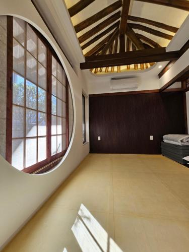 a large room with a large window and a large room with a large floor at SiEunJae in Gyeongju