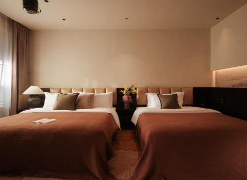 Una cama o camas en una habitación de 丽江云慕晚民宿