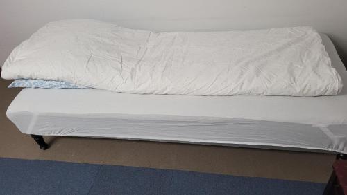 Ένα ή περισσότερα κρεβάτια σε δωμάτιο στο Budget Rooms Copenhagen