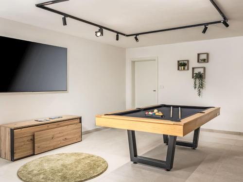 TV a/nebo společenská místnost v ubytování Villa Brax8 by Interhome