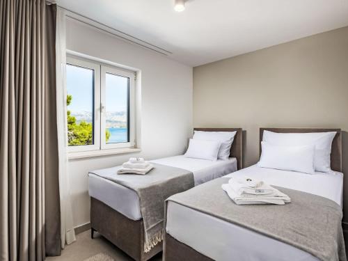 Postel nebo postele na pokoji v ubytování Villa Brax8 by Interhome