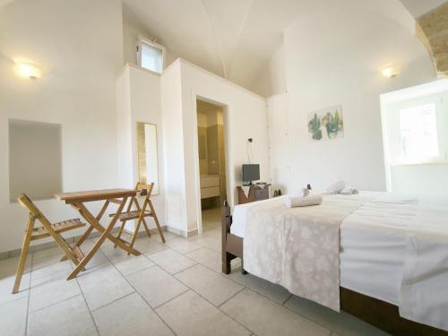 Ein Bett oder Betten in einem Zimmer der Unterkunft Apartment Le Cementine-1 by Interhome