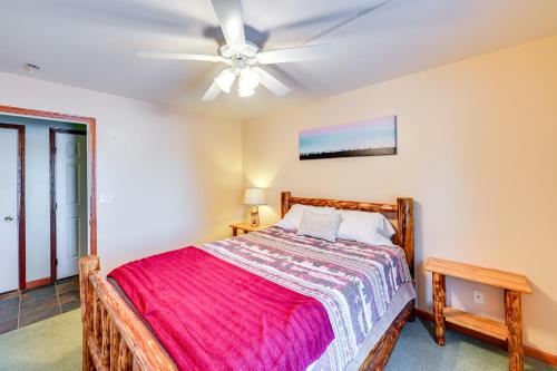 a bedroom with a bed and a ceiling fan at 3 Mi to Dtwn Mtn-View Red Lodge Retreat! in Red Lodge