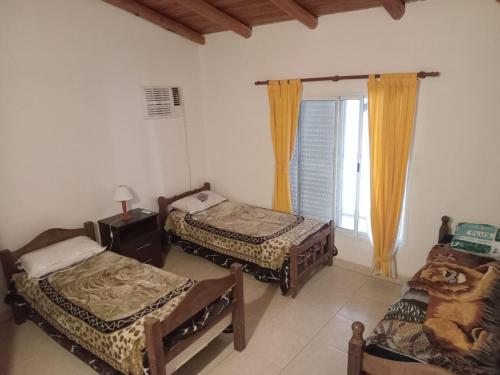 Postel nebo postele na pokoji v ubytování Casa Chalet