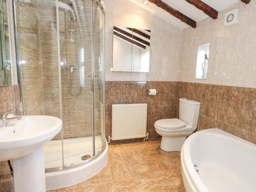 Et badeværelse på Anchor Cottage