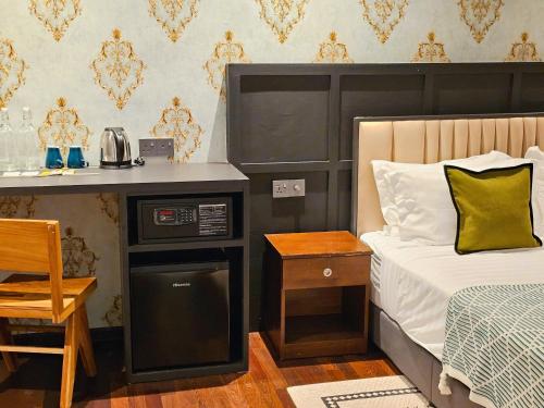 Kuchyň nebo kuchyňský kout v ubytování Carnarvon Suites By Reunion