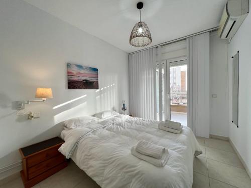 Posteľ alebo postele v izbe v ubytovaní Cozy apartment on the beach of Calpe