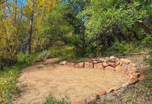 a pile of rocks on the side of a dirt road at GrayRock in Eagle