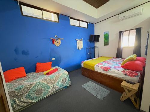 Postel nebo postele na pokoji v ubytování Passifloras Hostel