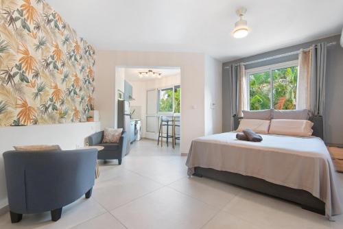 Le Studio à deux pas de la mer , confort moderne au cœur de Saint-Gilles les Bains