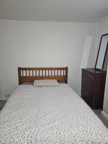 Ένα ή περισσότερα κρεβάτια σε δωμάτιο στο Home away from home