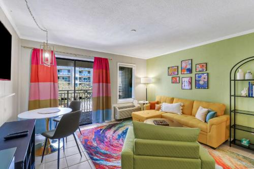 a living room with a couch and a table at Ocean Views Retreat to Ocean Dunes Villa in Hilton Head Island