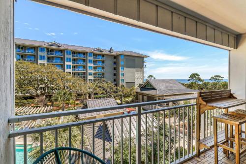a balcony with a view of a resort at Ocean Views Retreat to Ocean Dunes Villa in Hilton Head Island