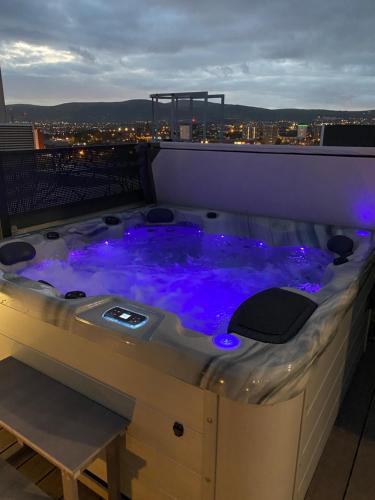 a hot tub on the roof of a building at James Clow Bed & Breakfast in Belfast