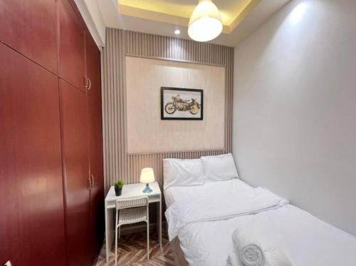 Ένα ή περισσότερα κρεβάτια σε δωμάτιο στο Network Partition Room Near Internet City Metro