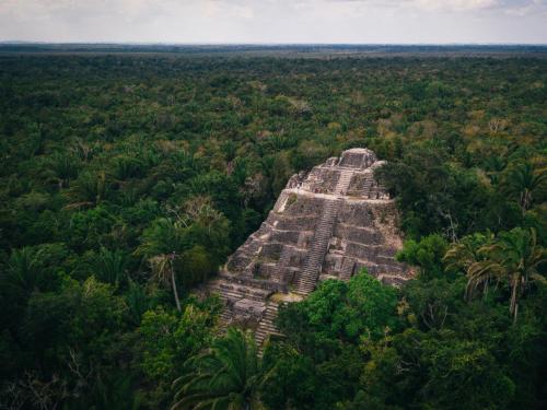 an aerial view of the ruins of the pyramid at Orchid Bay Resort in Corozal
