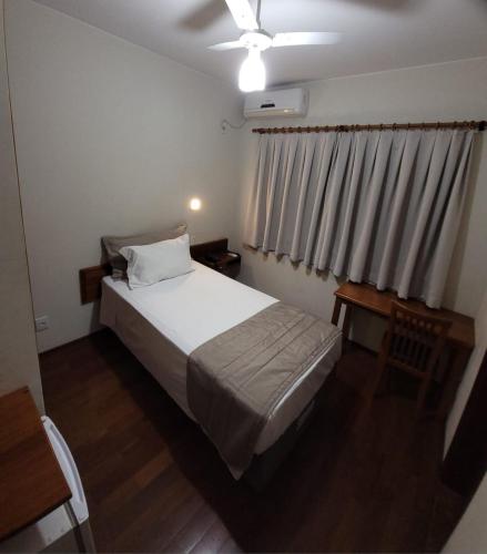 Ένα ή περισσότερα κρεβάτια σε δωμάτιο στο Hotel Giordano Centro