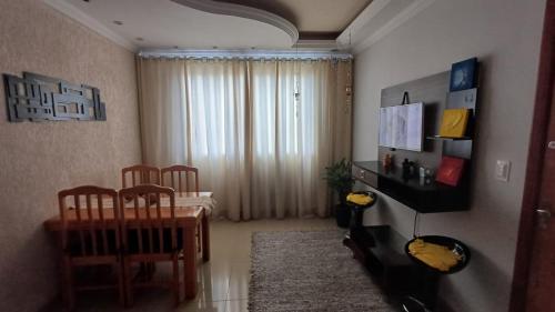 TV o dispositivi per l'intrattenimento presso Apartamento de 3 quartos