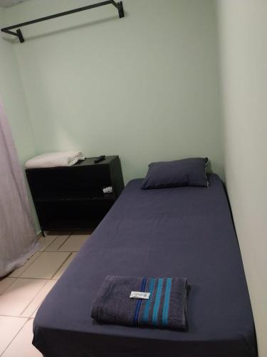 Postel nebo postele na pokoji v ubytování Hotel Toka do Skillo
