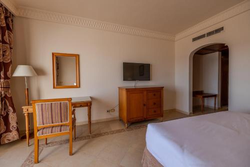 Voodi või voodid majutusasutuse Continental Plaza Beach Resort toas